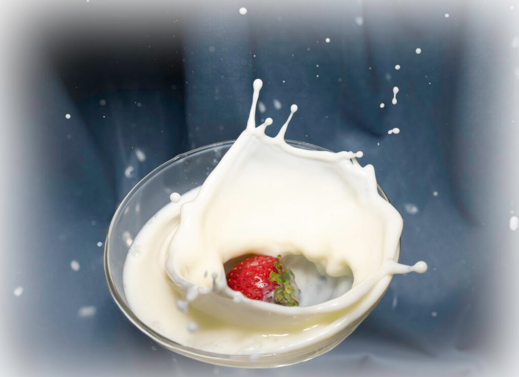 High speed photography milk crown splash with strawberry fine art by Hadi Baradaran ArtQuestor