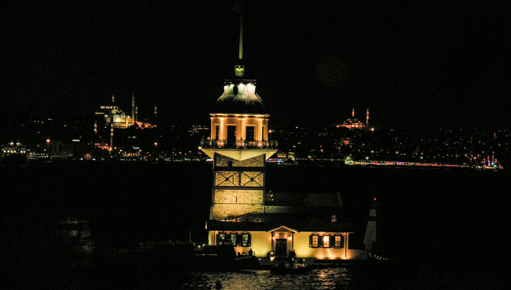 Kiz Kulesi Maiden's Tower Istanbul night photography glowing golden light Bosphorus by Hadi Baradaran ArtQuestor