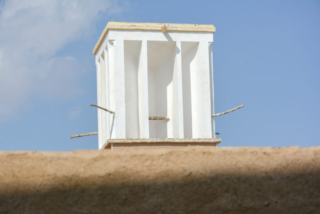 White Persian badgeer wind catcher tower against blue sky Kashan Iran fine art architectural photography by Hadi Baradaran ArtQuestor