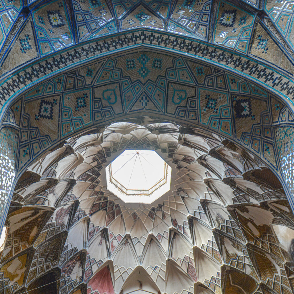 Wide angle view of Timche dome skylight muqarnas concentric rings Kashan Bazaar Iran fine art photography by Hadi Baradaran ArtQuestor