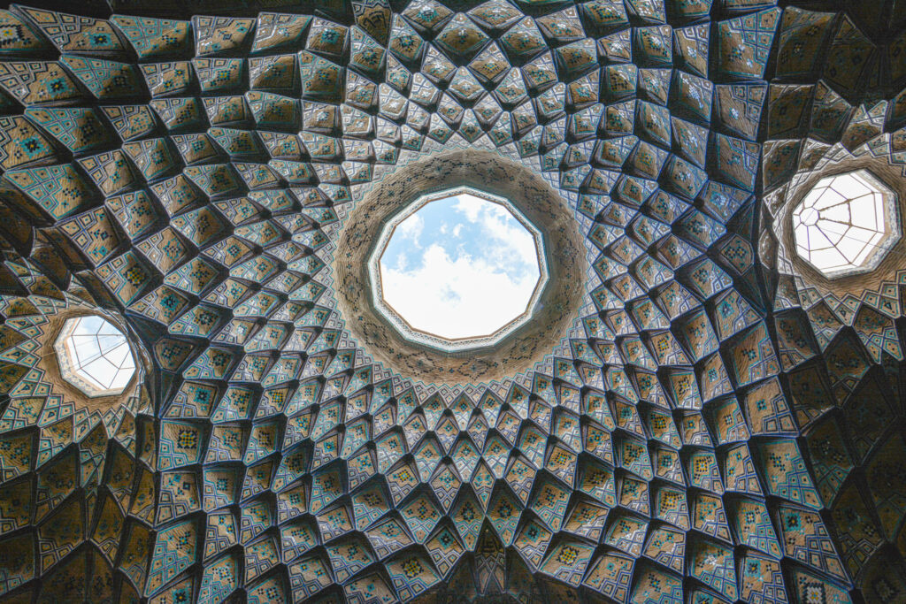 Overhead view of ornate Timche dome ceiling muqarnas geometric pattern Kashan Bazaar Iran fine art photography by Hadi Baradaran ArtQuestor