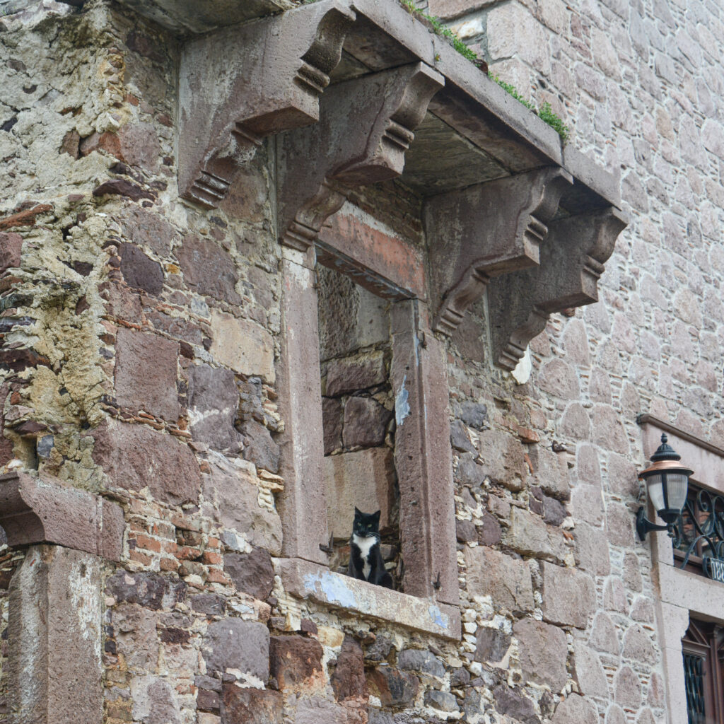 Home old Mediterranean stone window ornate carved details weathered building fine art architectural photography by Hadi Baradaran ArtQuestor