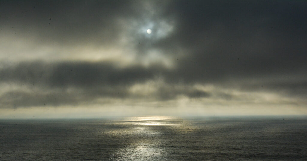 stormy ocean dark clouds dusk twilight dramatic seascape fine art photography by Hadi Baradaran ArtQuestor