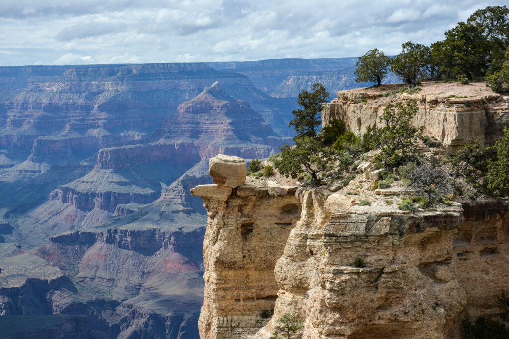 Grand Canyon panoramic view layered red orange rock blue sky Arizona fine art landscape photography by Hadi Baradaran ArtQuestor